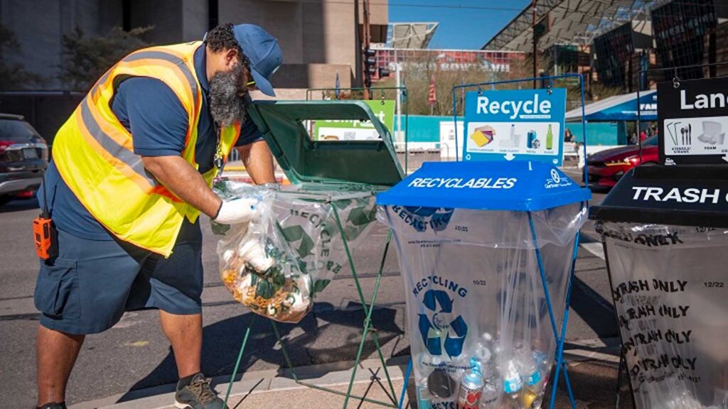 Man organizing the waste in downtown Phoenix, AZ for Super Bowl LVII Weekend